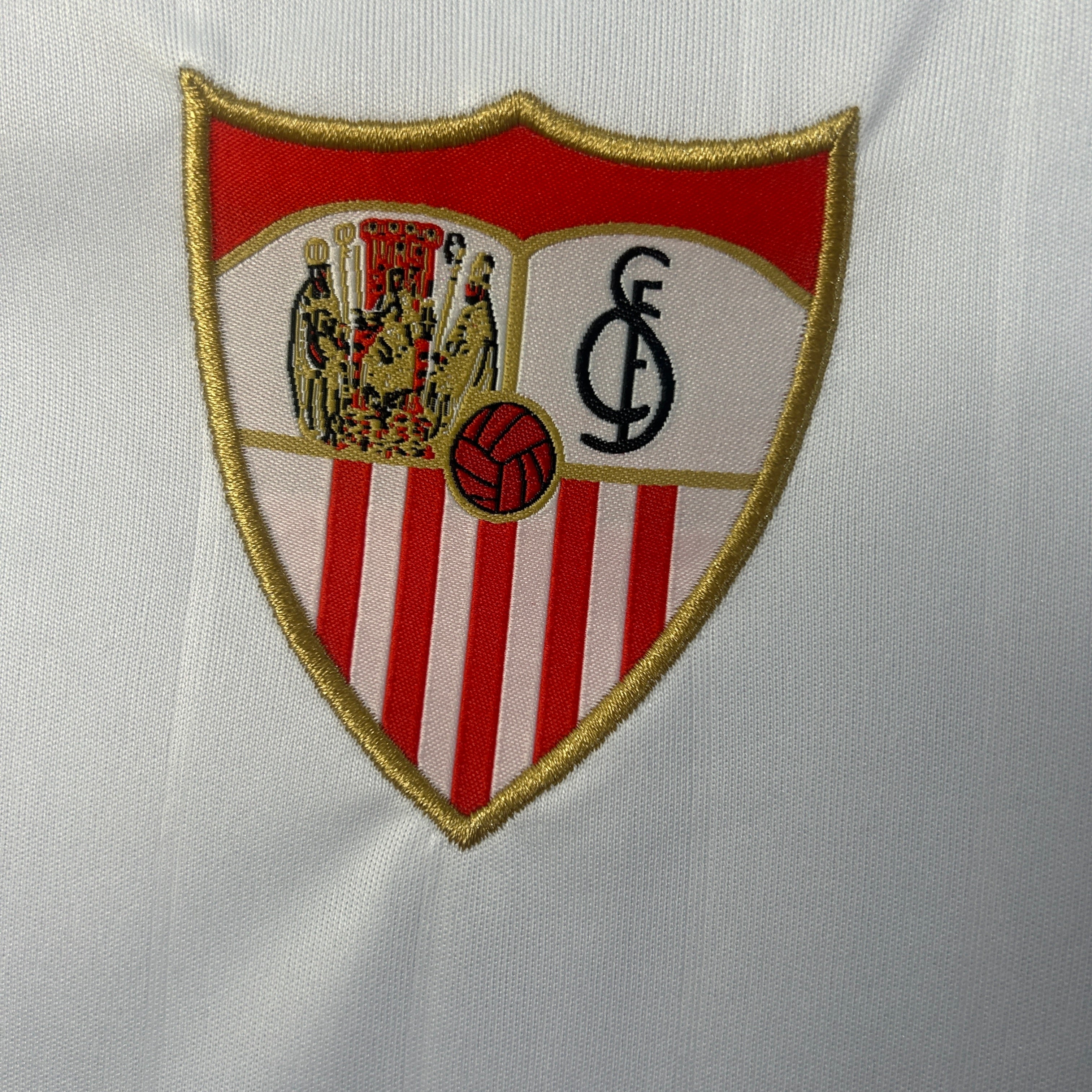 Sevilla home jersey. Season 25/26