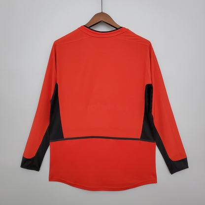 Manchester United logsleeve home jersey. Season 03/04