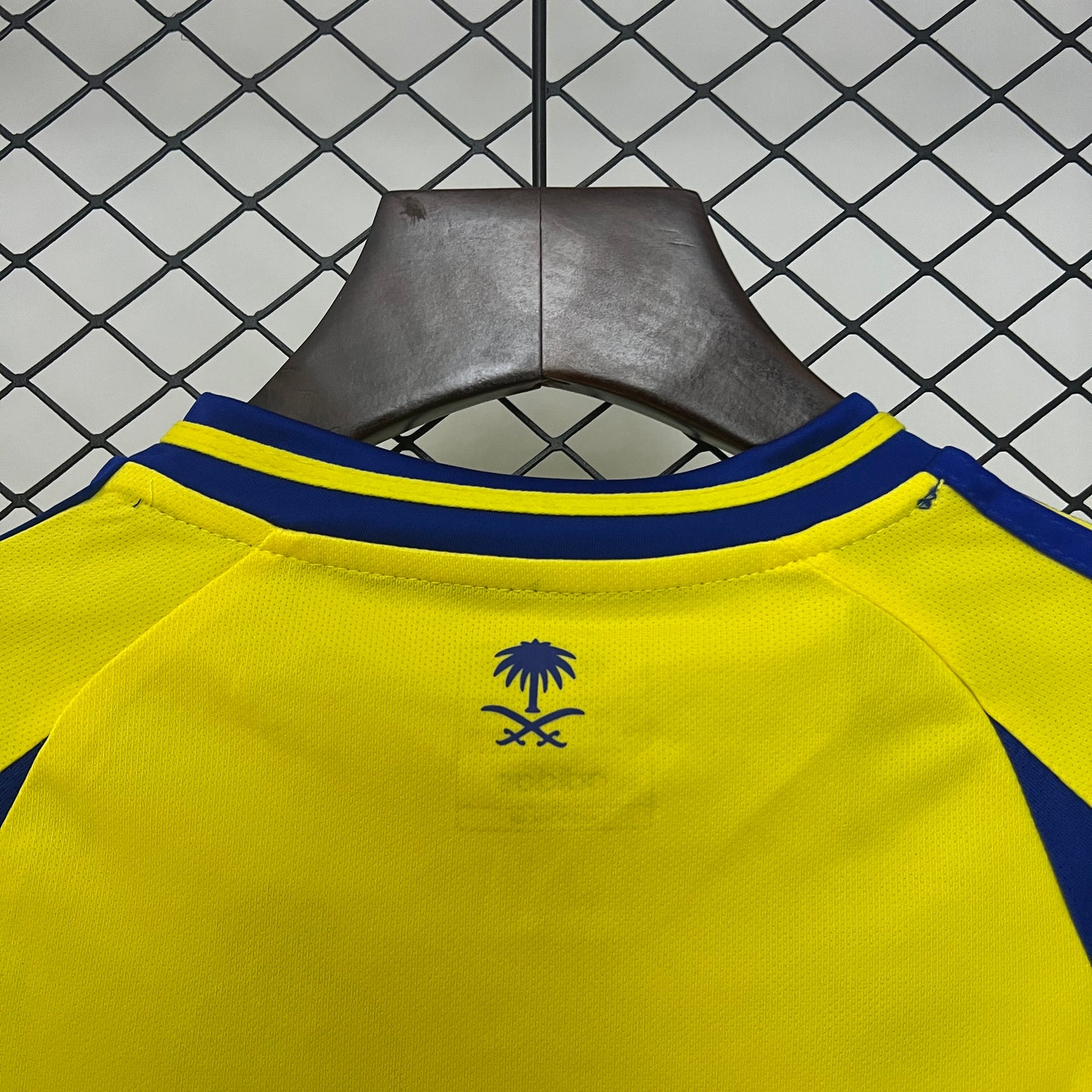 Al-Nassr home kids set. Season 24/25