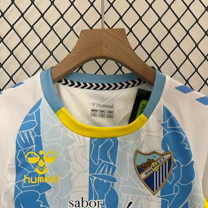 Malaga home kids set. Season 24/25
