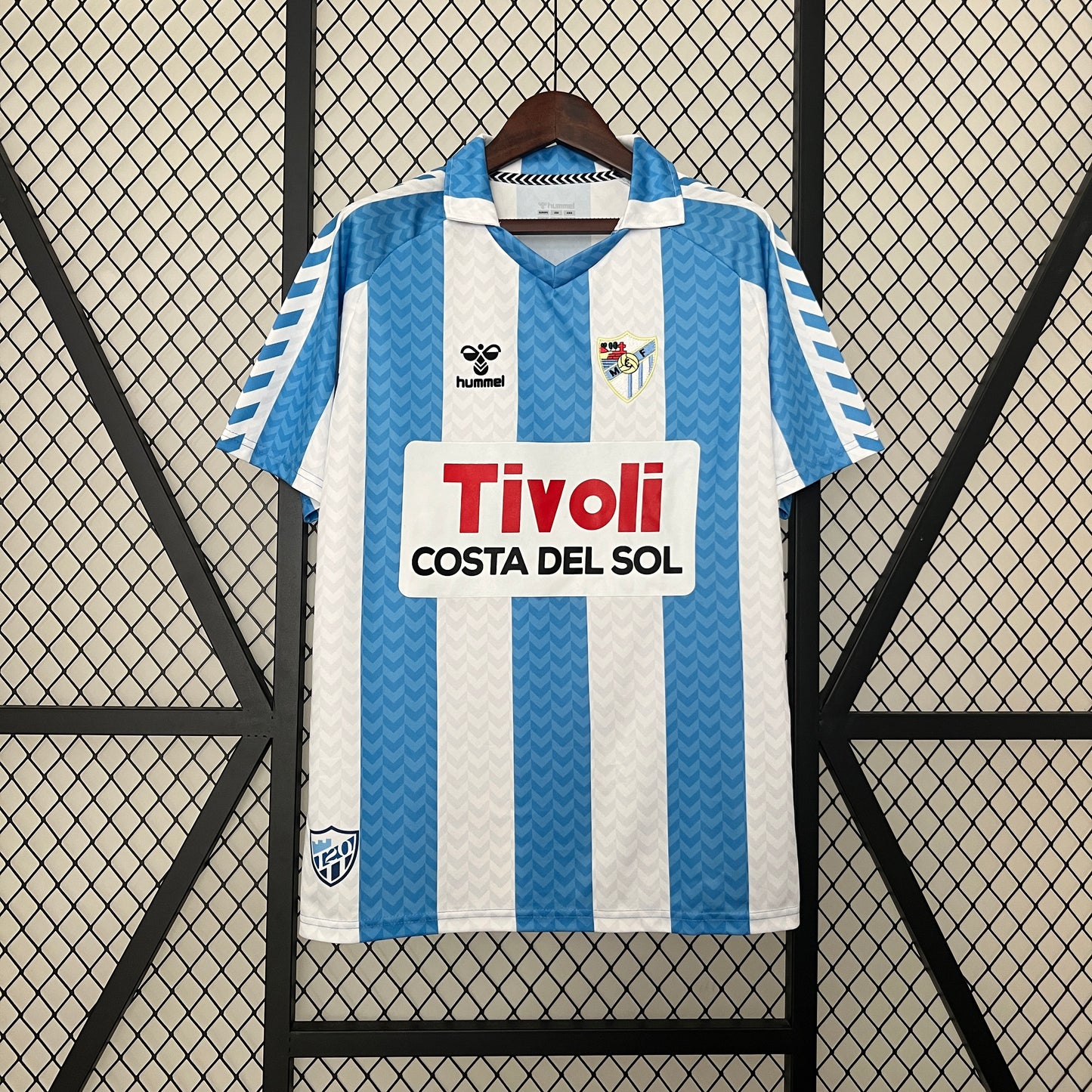 Malaga CF 120th Anniversary home jersey.