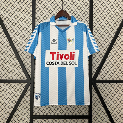Malaga CF 120th Anniversary home jersey.