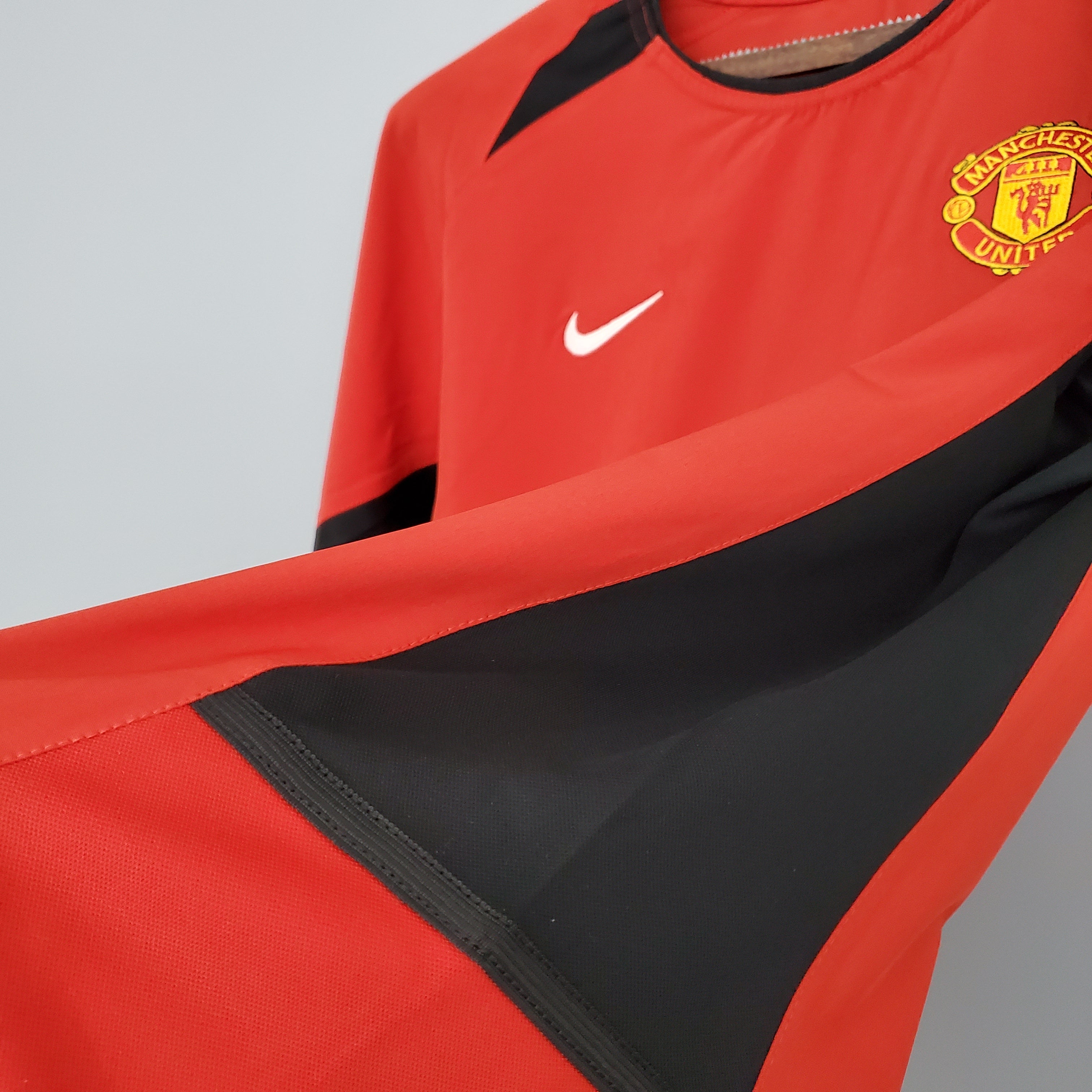 Manchester United logsleeve home jersey. Season 03/04