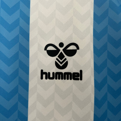 Malaga CF 120th Anniversary home jersey.