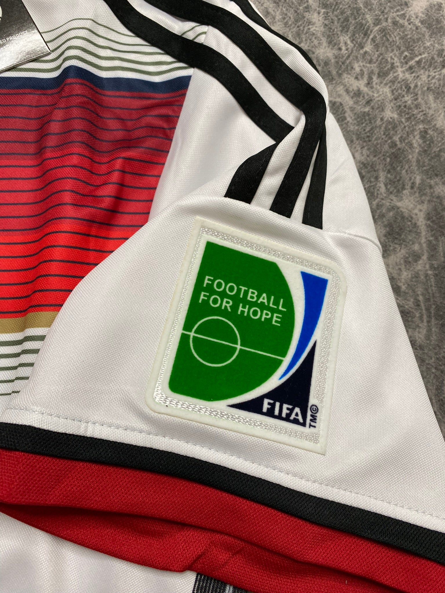 Germany's home jersey for the 2014 World Cup. Thomas Muller