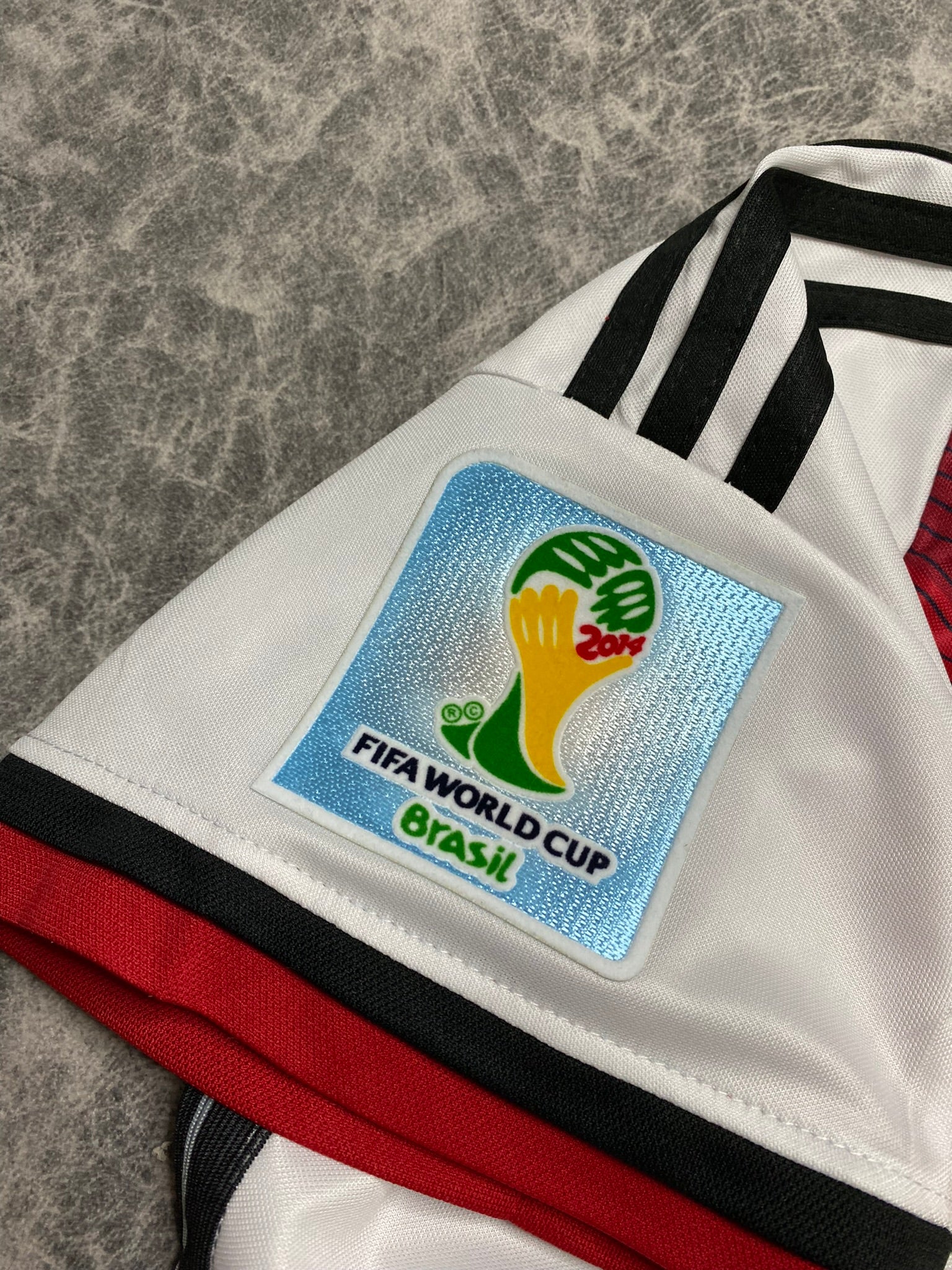 Germany's home jersey for the 2014 World Cup. Thomas Muller