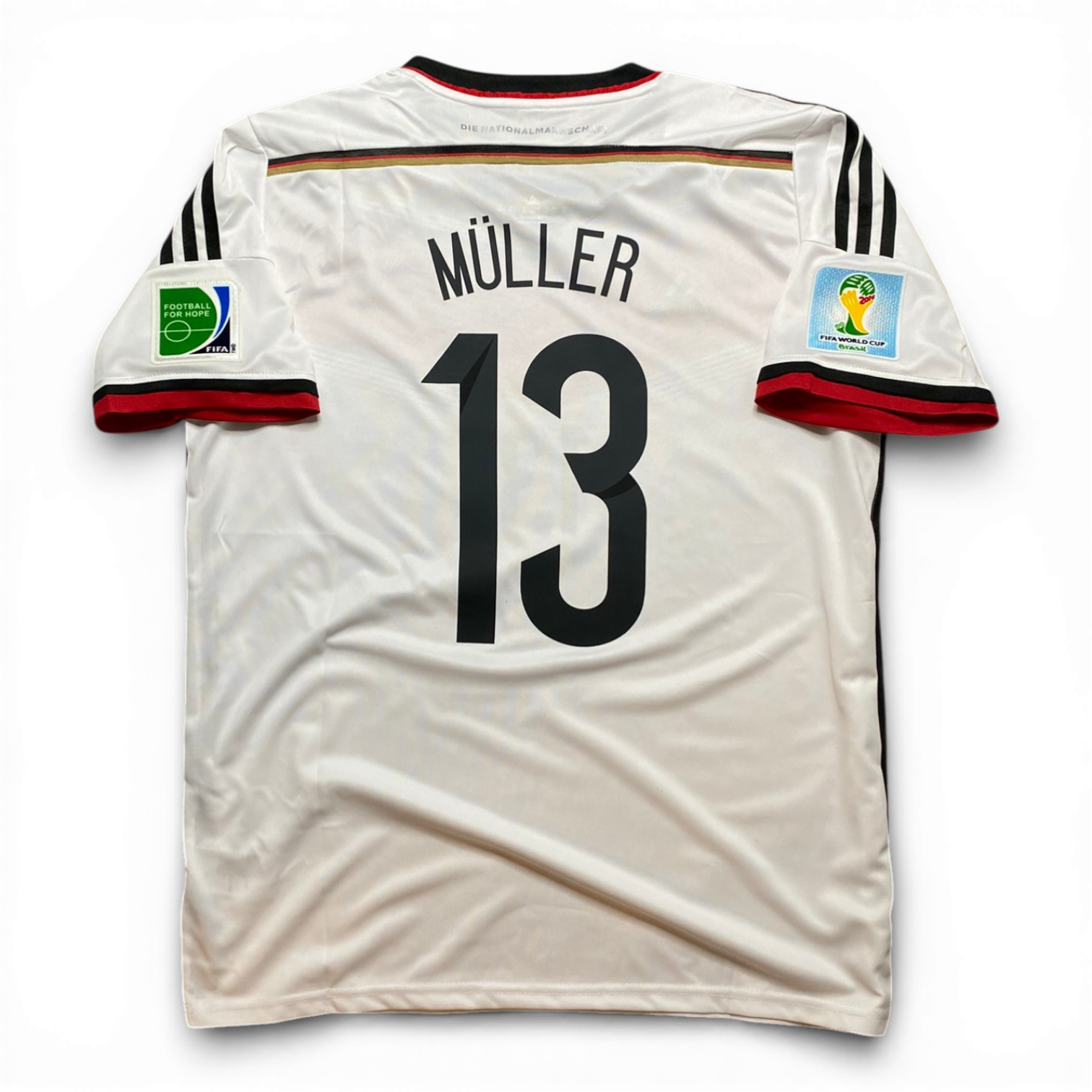 Germany's home jersey for the 2014 World Cup. Thomas Muller