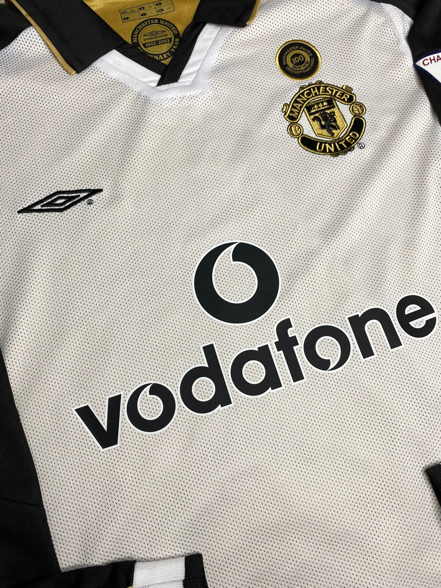 Manchester United reversible jersey commemorating the club's 100th anniversary. Season 01/02. David Beckham