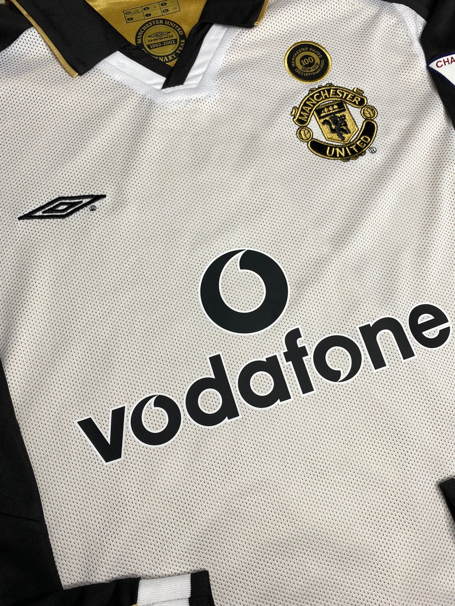 Manchester United reversible jersey commemorating the club's 100th anniversary. Season 01/02. David Beckham