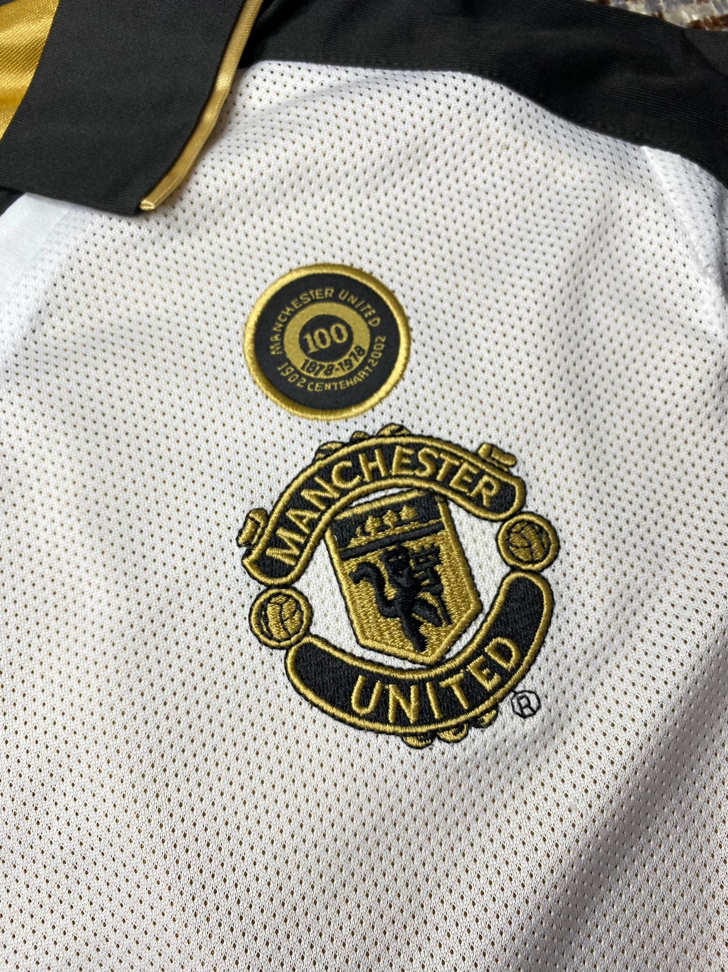 Manchester United reversible jersey commemorating the club's 100th anniversary. Season 01/02. David Beckham