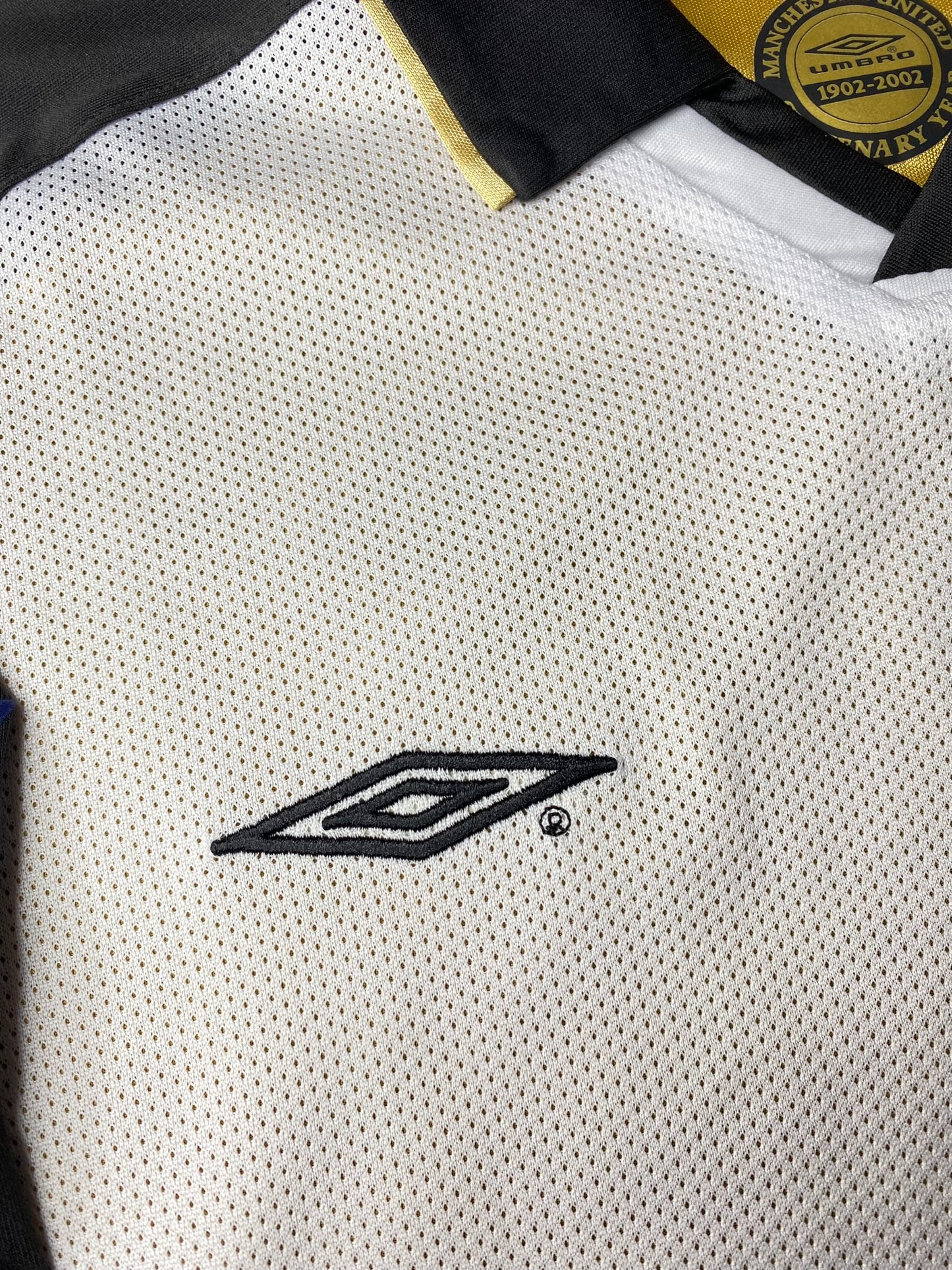 Manchester United reversible jersey commemorating the club's 100th anniversary. Season 01/02. David Beckham