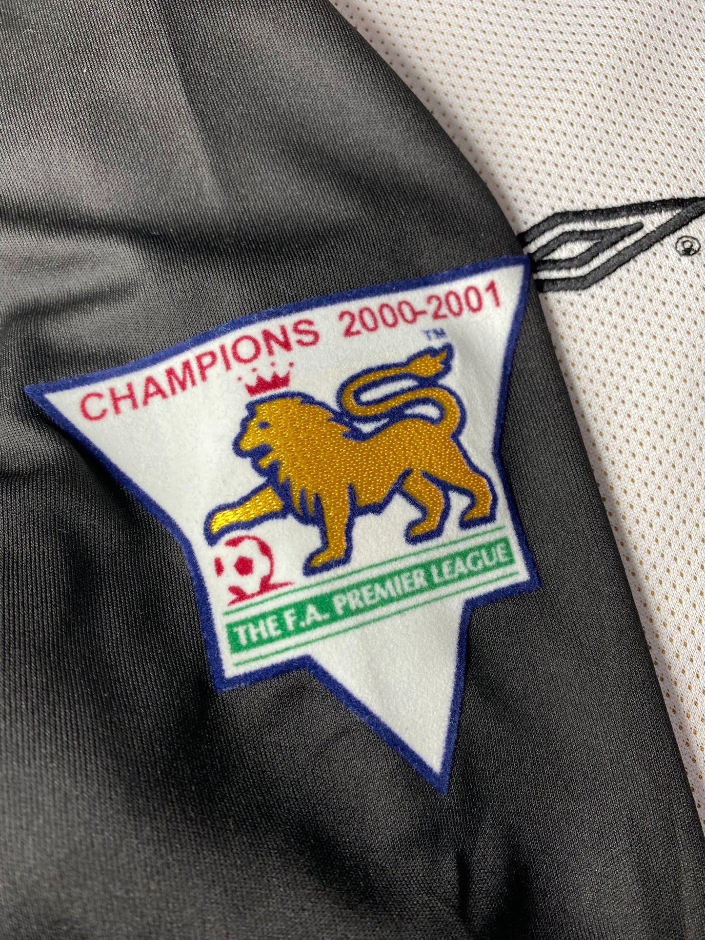 Manchester United reversible jersey commemorating the club's 100th anniversary. Season 01/02. David Beckham