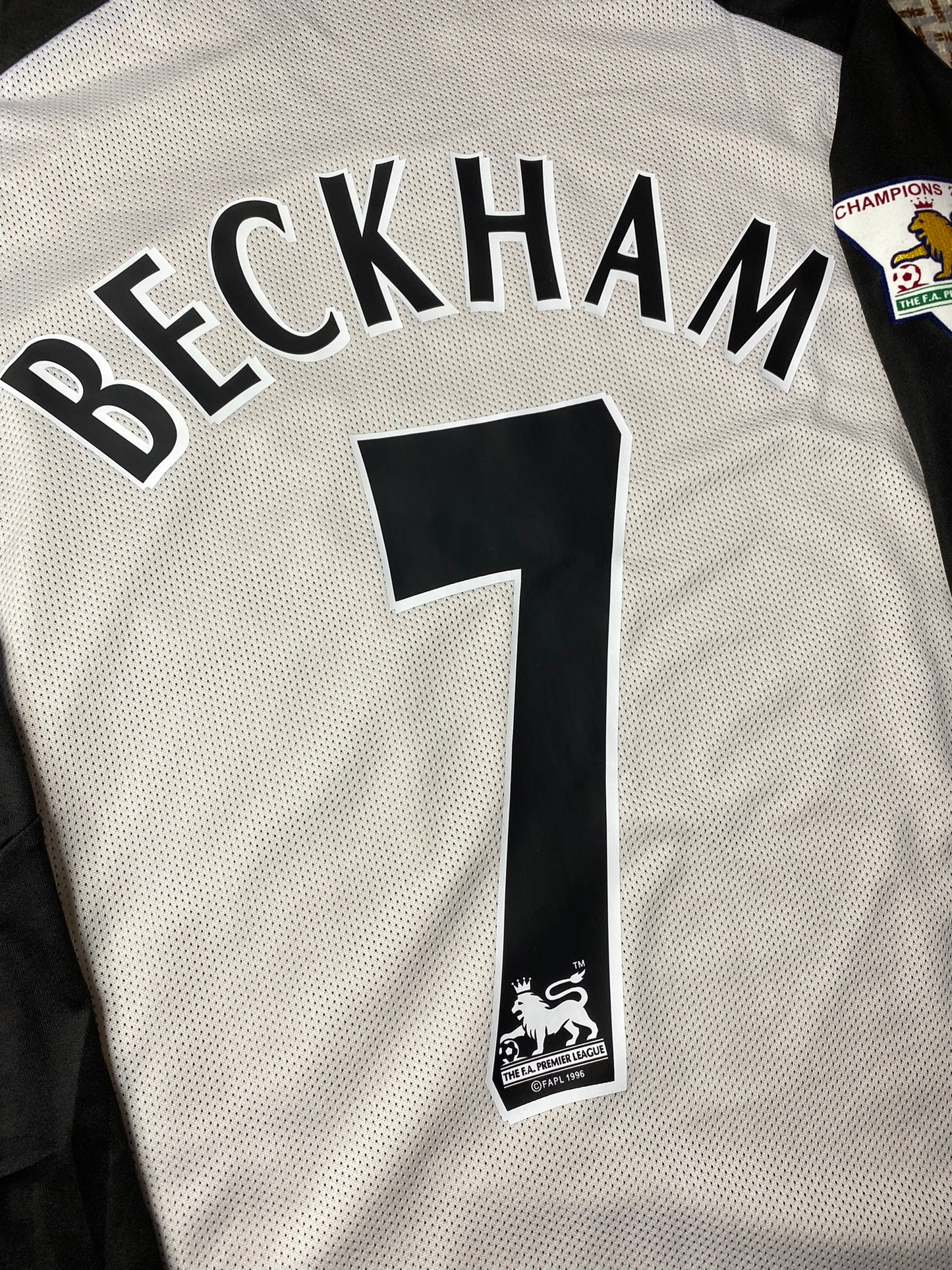 Manchester United reversible jersey commemorating the club's 100th anniversary. Season 01/02. David Beckham