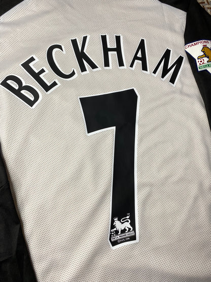 Manchester United reversible jersey commemorating the club's 100th anniversary. Season 01/02. David Beckham