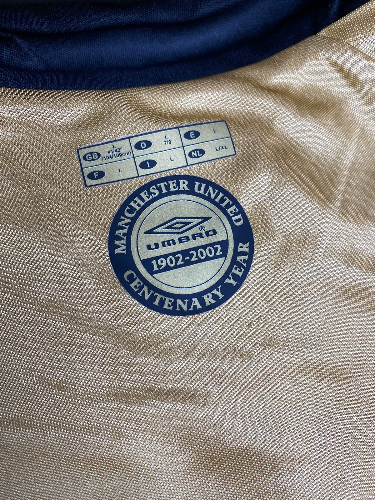 Manchester United reversible jersey commemorating the club's 100th anniversary. Season 01/02. David Beckham