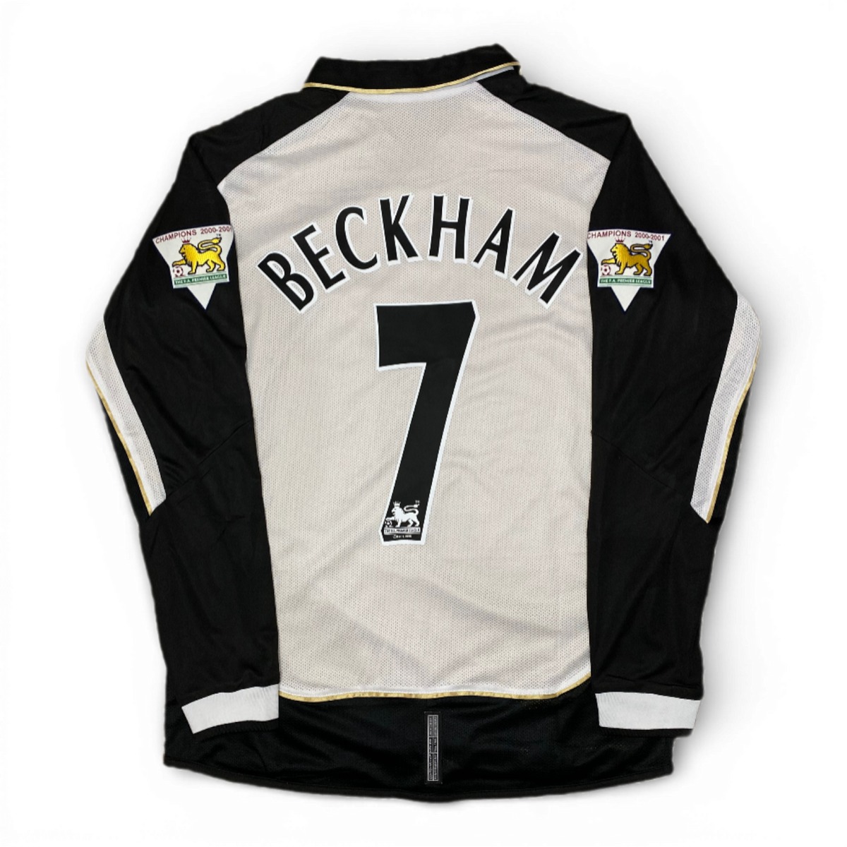 Manchester United reversible jersey commemorating the club's 100th anniversary. Season 01/02. David Beckham