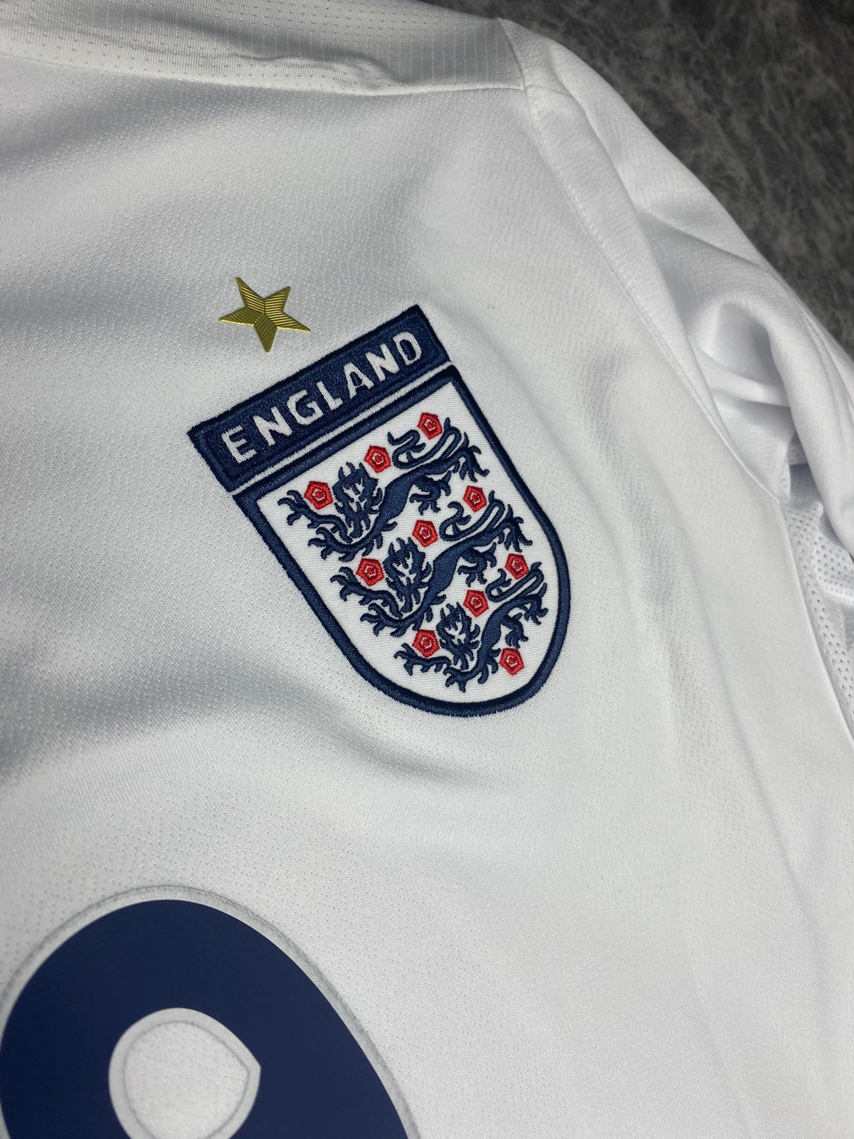 England's longsleeve home jersey for the 2006 World Cup. Wayne Rooney