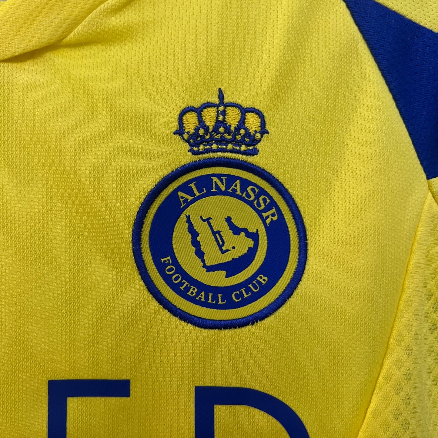 Al-Nassr home kids set. Season 24/25