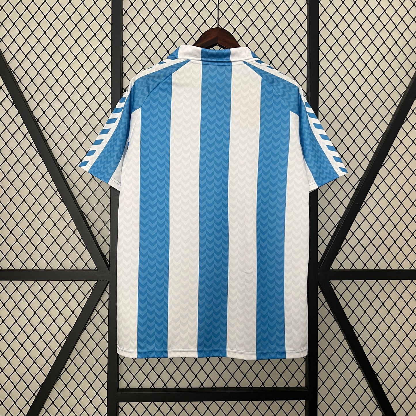 Malaga CF 120th Anniversary home jersey.