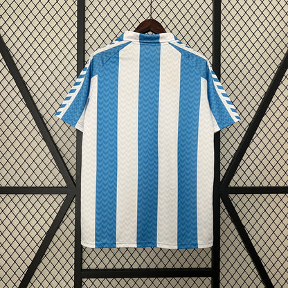 Malaga CF 120th Anniversary home jersey.