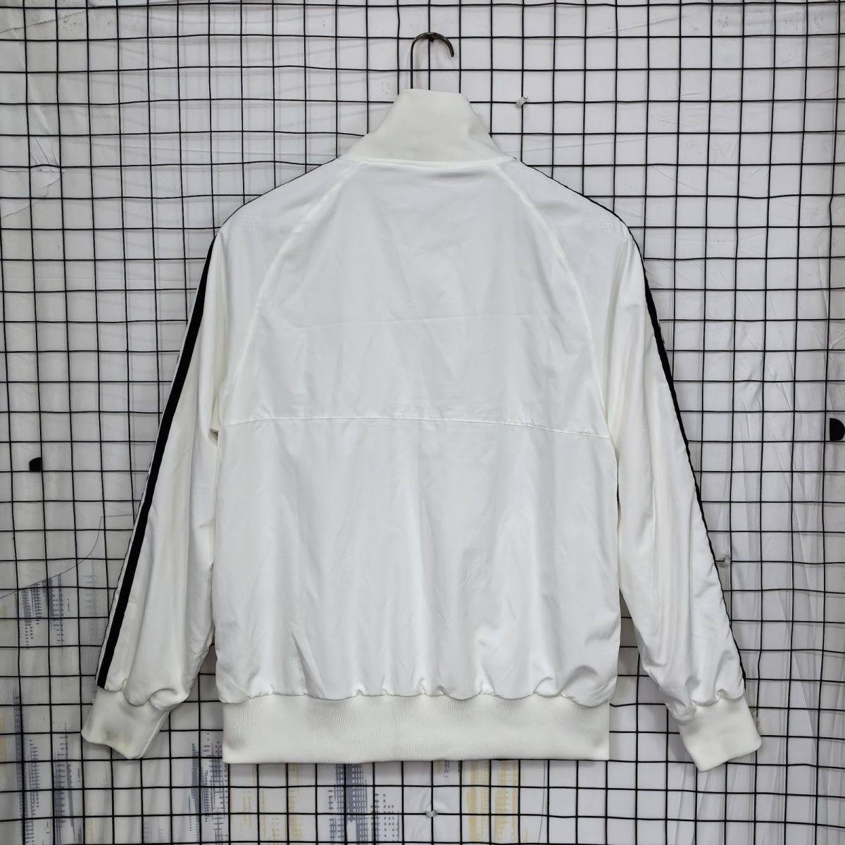 Real Madrid 12/13 vintage Windbreaker.